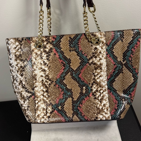 Calvin Klein Hayden Snake Tote
NWOT - Picture 8 of 13